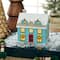 Maison de Noël peinte à DEL